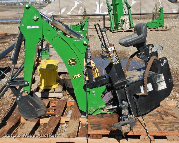 image for item HU9644 John Deere 375 backhoe attachment