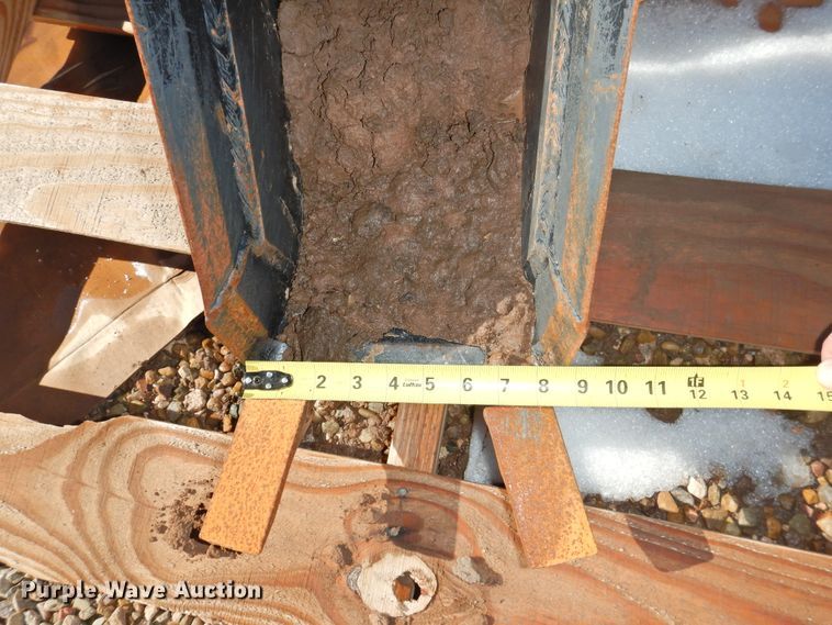 image for item HU9644 John Deere 375 backhoe attachment