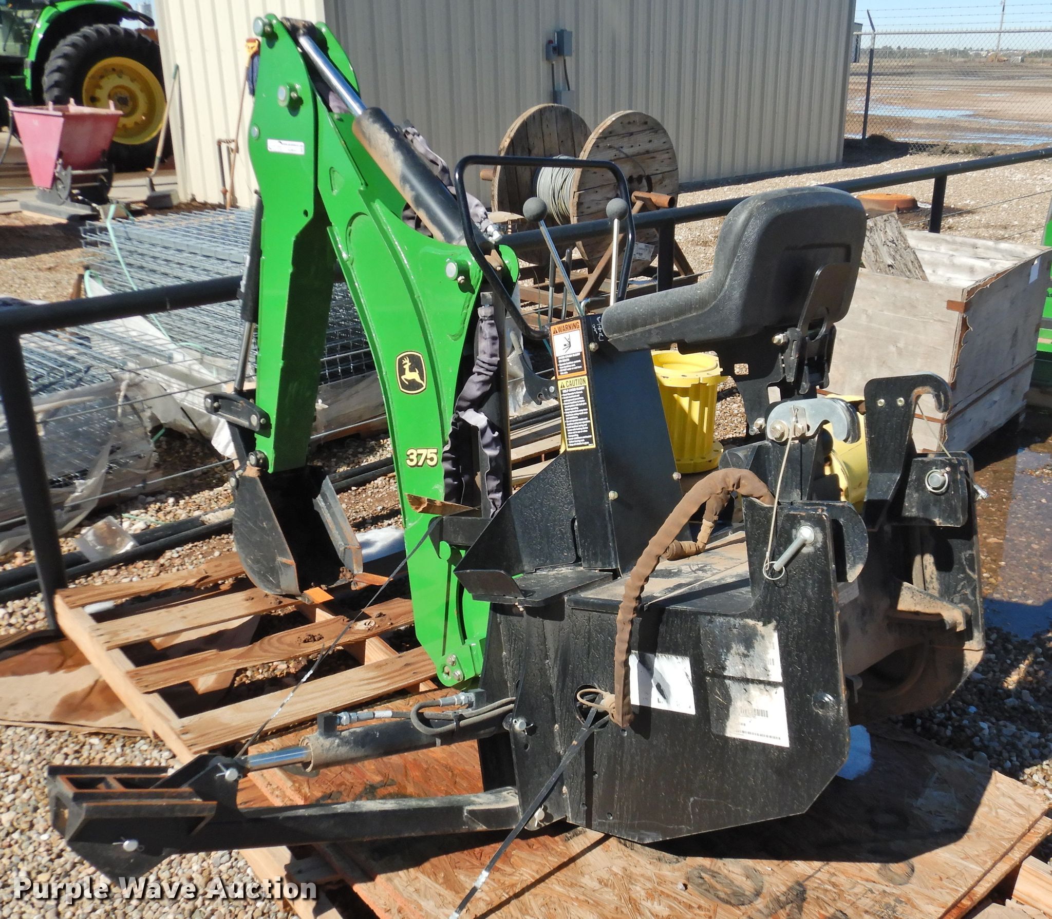 John Deere 375 backhoe attachment in Dimmitt, TX Item HU9644 sold