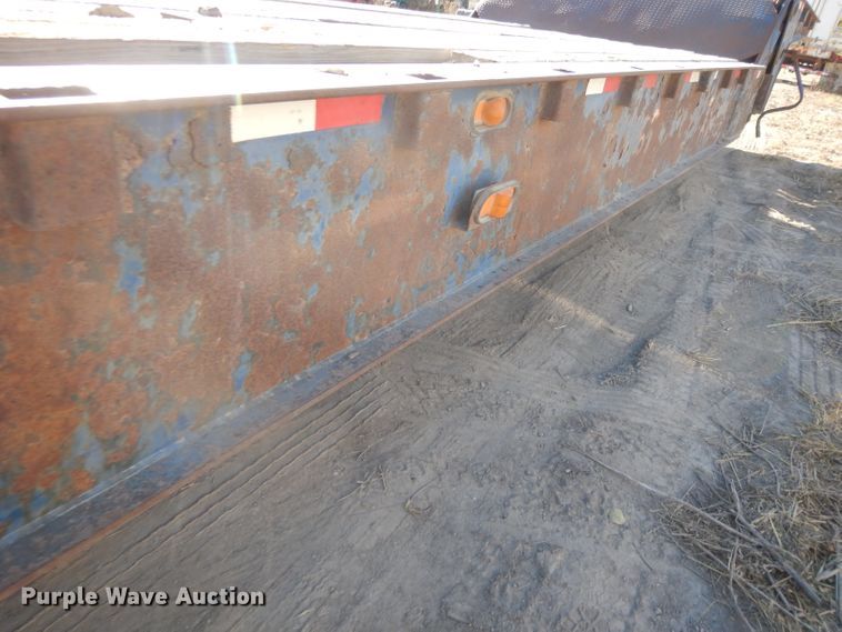 image for item DH3397 2005 Traileze Trail King tilt deck trailer