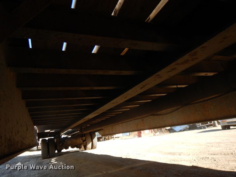 image for item DH3397 2005 Traileze Trail King tilt deck trailer