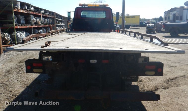 image for item DH5235 1999 International 4700  rollback truck