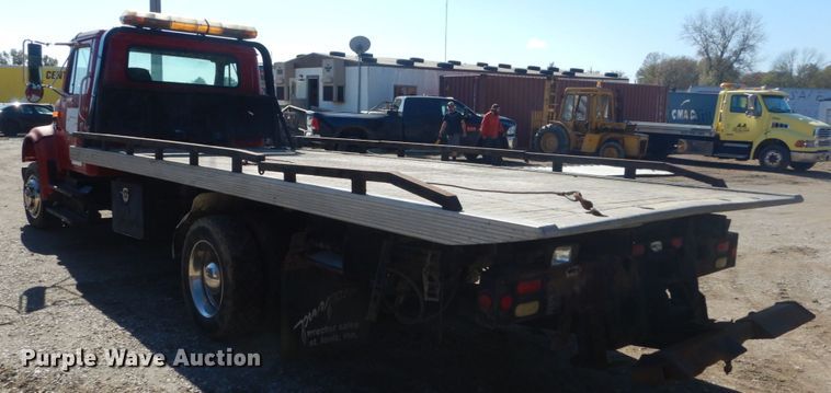 image for item DH5235 1999 International 4700  rollback truck