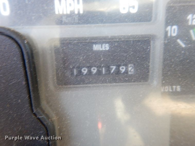 image for item DH5235 1999 International 4700  rollback truck