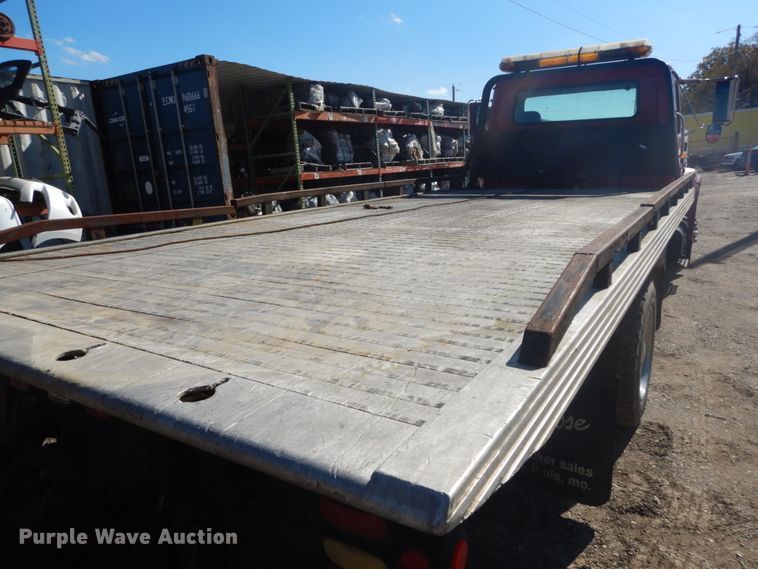 image for item DH5235 1999 International 4700  rollback truck