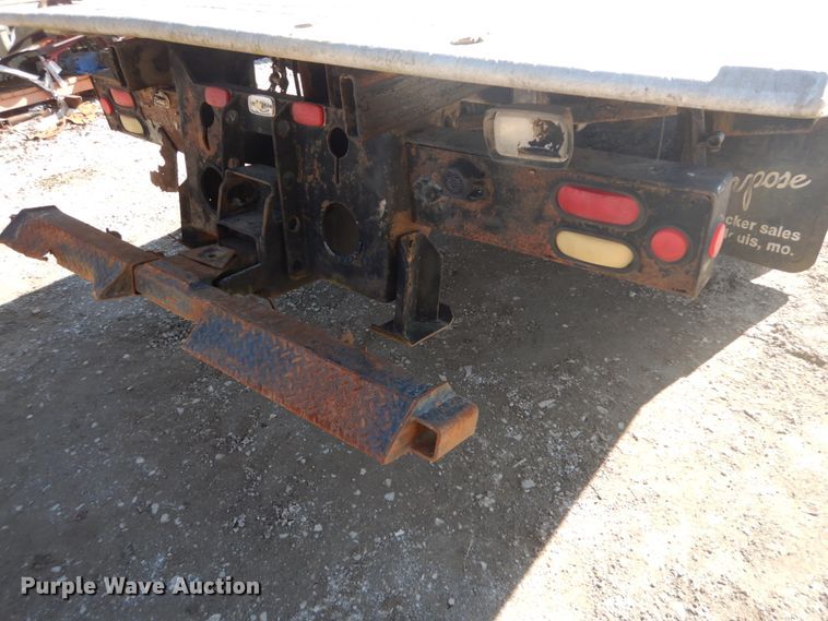 image for item DH5235 1999 International 4700  rollback truck