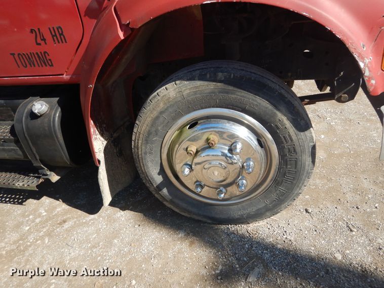 image for item DH5235 1999 International 4700  rollback truck