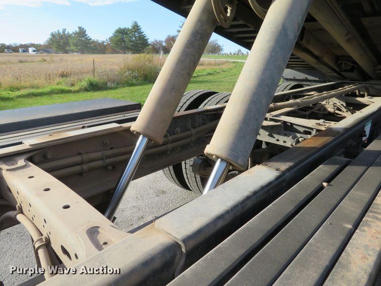 image for item DI3788 2012 Freightliner Business Class M2  rollback truck