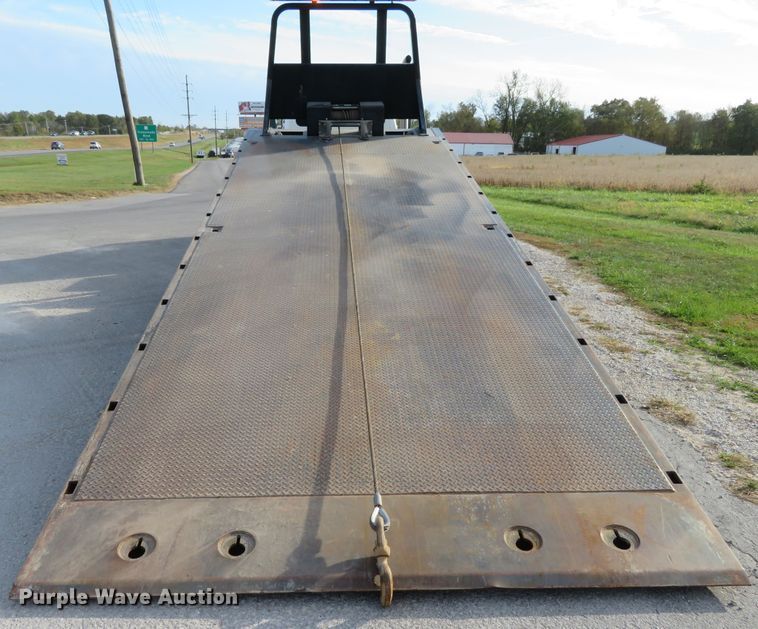 image for item DI3788 2012 Freightliner Business Class M2  rollback truck