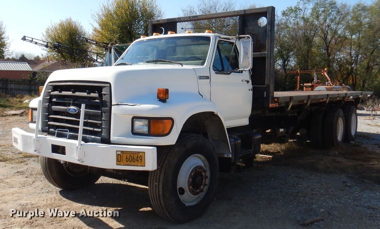 image for item DY9587 1996 Ford FT900  rollback truck