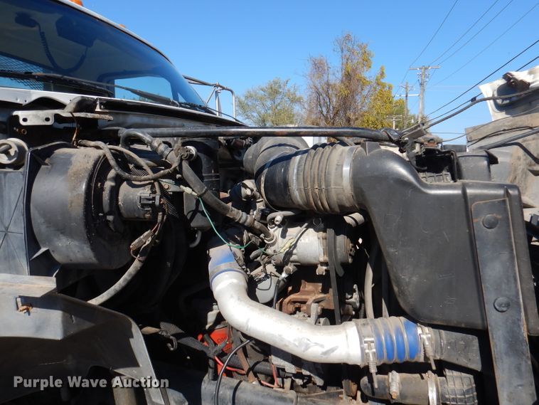 image for item DY9587 1996 Ford FT900  rollback truck