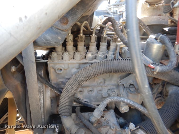 image for item DY9587 1996 Ford FT900  rollback truck