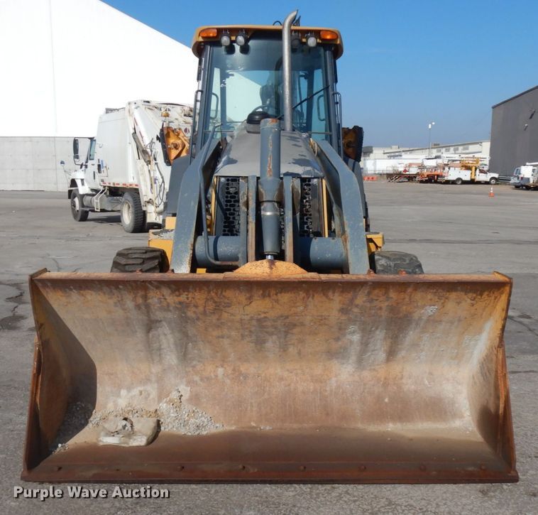 image for item DH7031 2009 John Deere 710J  backhoe