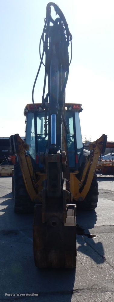 image for item DH7031 2009 John Deere 710J  backhoe