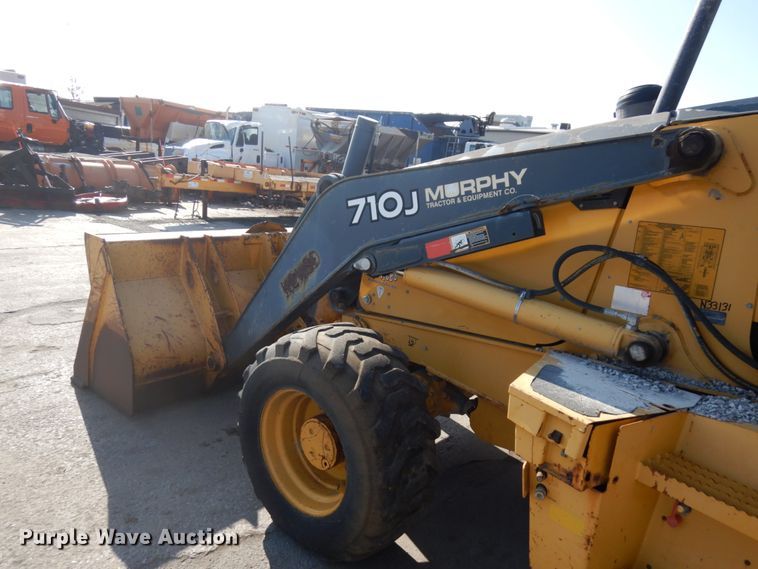 image for item DH7031 2009 John Deere 710J  backhoe