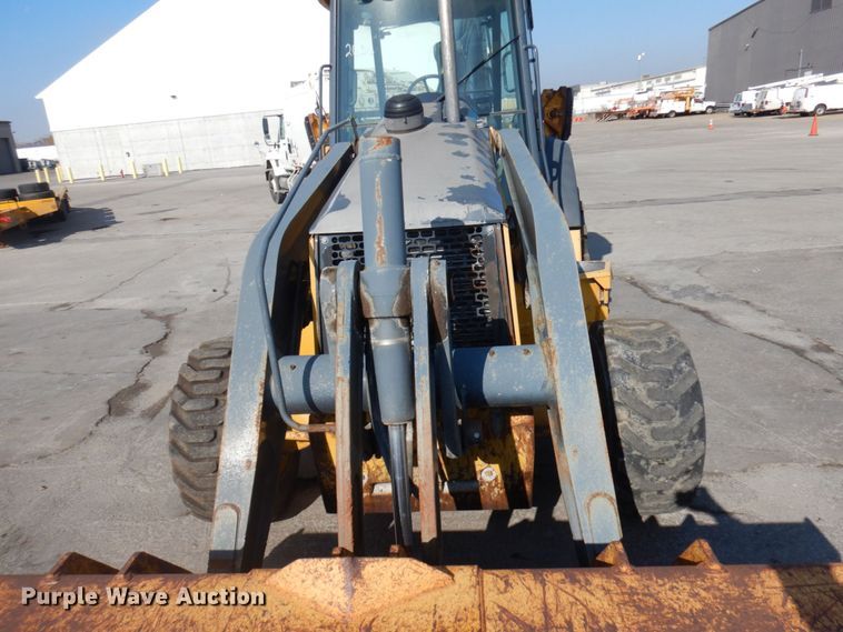 image for item DH7031 2009 John Deere 710J  backhoe