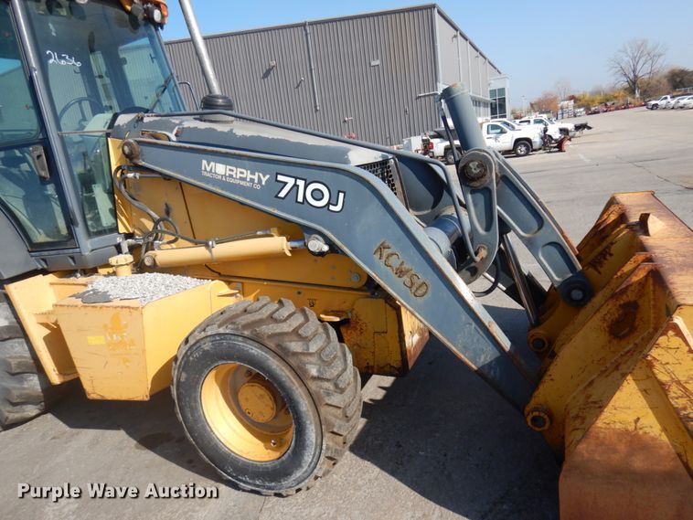 image for item DH7031 2009 John Deere 710J  backhoe