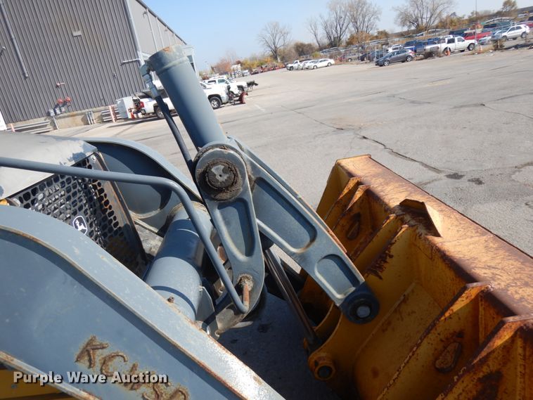 image for item DH7031 2009 John Deere 710J  backhoe