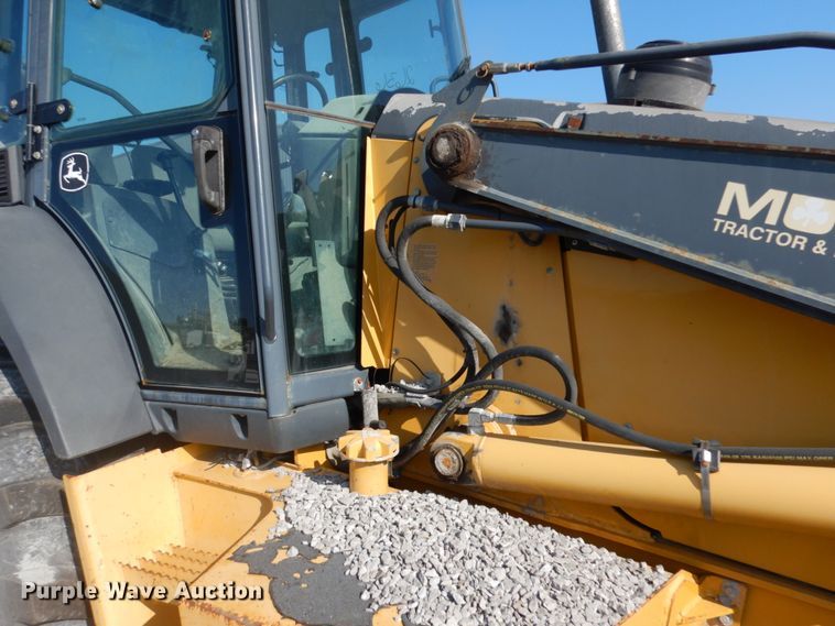 image for item DH7031 2009 John Deere 710J  backhoe