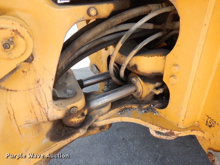 image for item DH7031 2009 John Deere 710J  backhoe