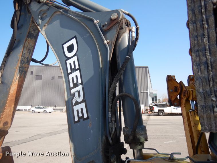 image for item DH7031 2009 John Deere 710J  backhoe