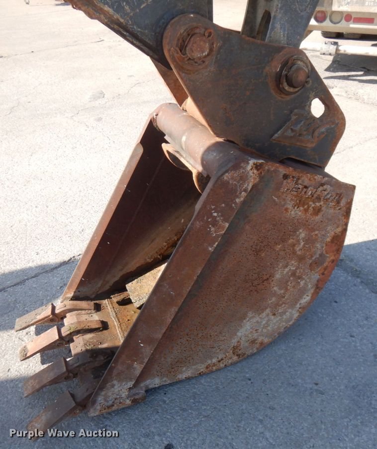 image for item DH7031 2009 John Deere 710J  backhoe