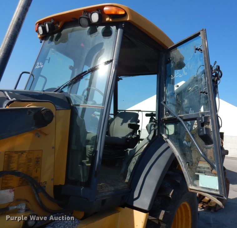 image for item DH7031 2009 John Deere 710J  backhoe