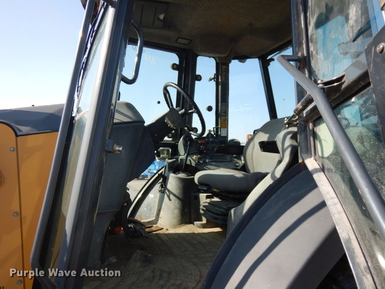 image for item DH7031 2009 John Deere 710J  backhoe