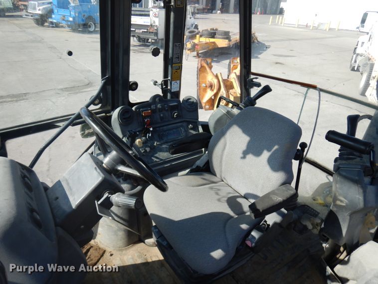 image for item DH7031 2009 John Deere 710J  backhoe