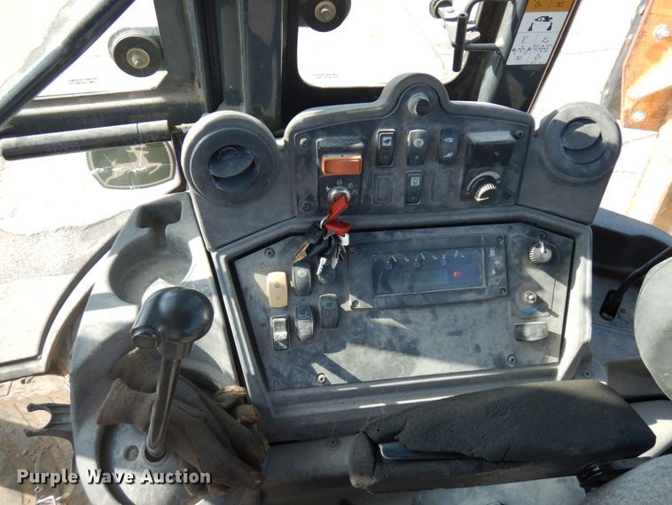 image for item DH7031 2009 John Deere 710J  backhoe