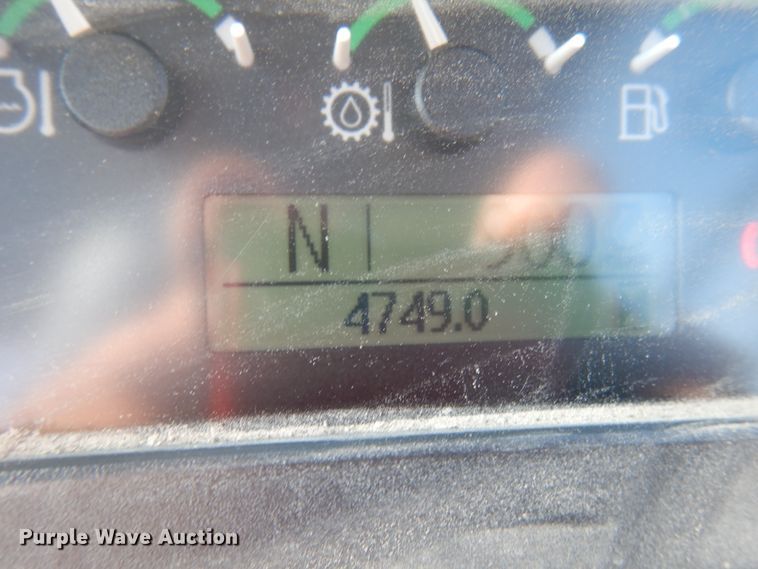 image for item DH7031 2009 John Deere 710J  backhoe