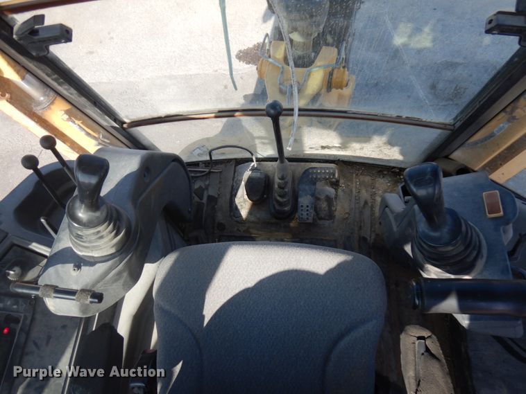 image for item DH7031 2009 John Deere 710J  backhoe