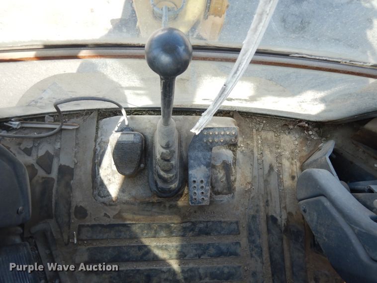 image for item DH7031 2009 John Deere 710J  backhoe