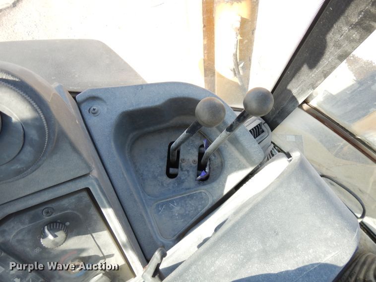 image for item DH7031 2009 John Deere 710J  backhoe