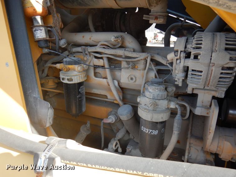 image for item DH7031 2009 John Deere 710J  backhoe