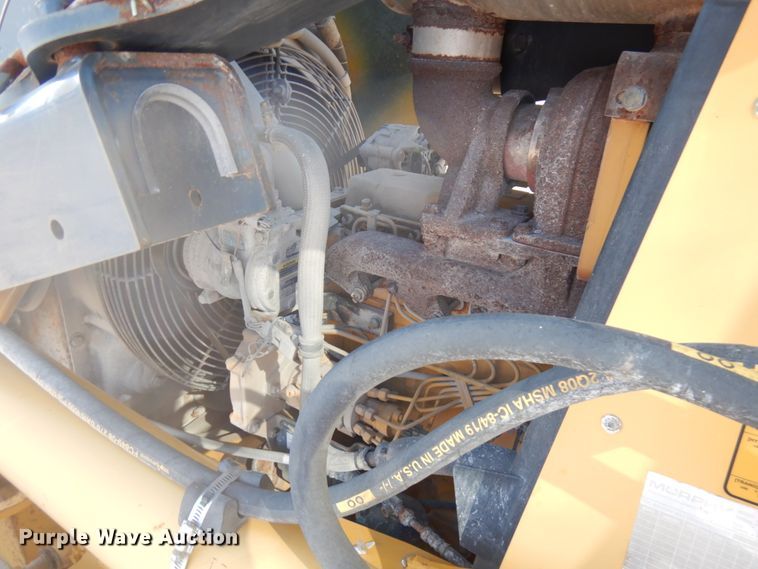 image for item DH7031 2009 John Deere 710J  backhoe