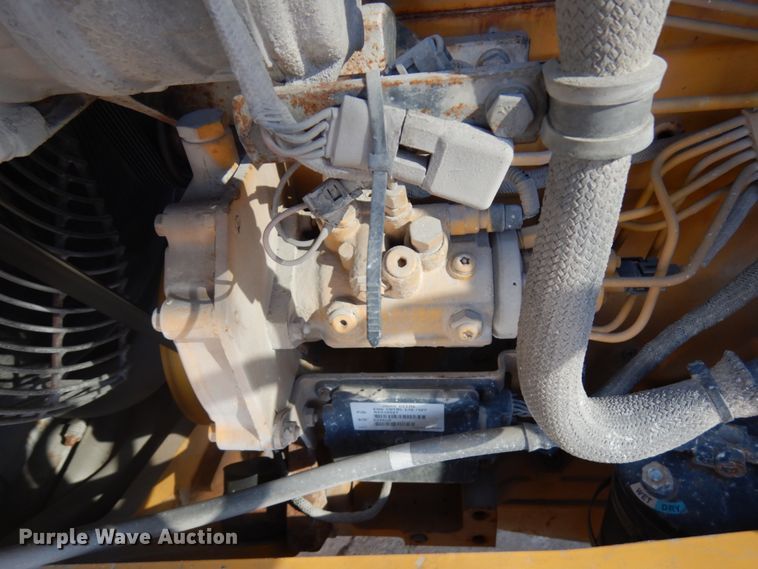 image for item DH7031 2009 John Deere 710J  backhoe