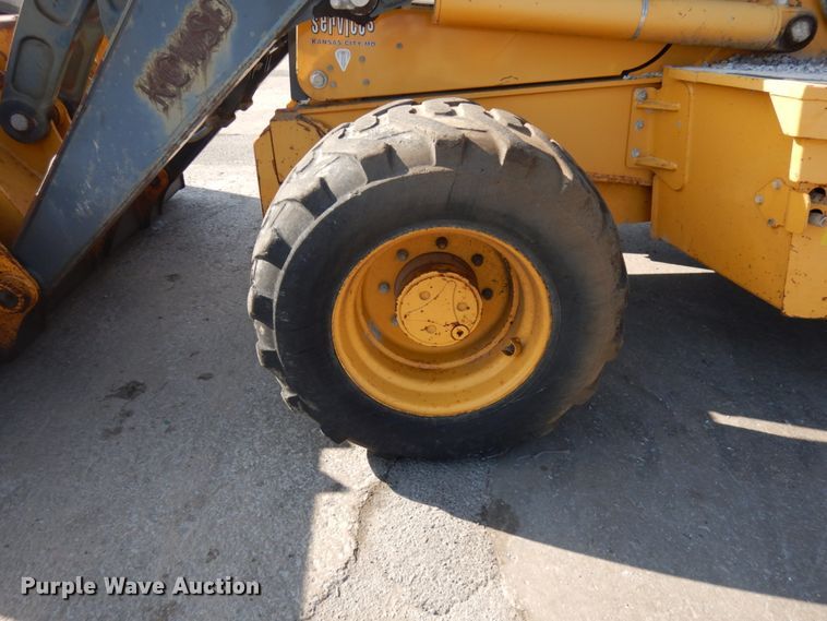 image for item DH7031 2009 John Deere 710J  backhoe