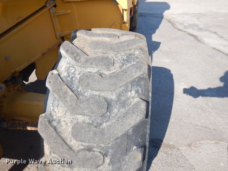 image for item DH7031 2009 John Deere 710J  backhoe