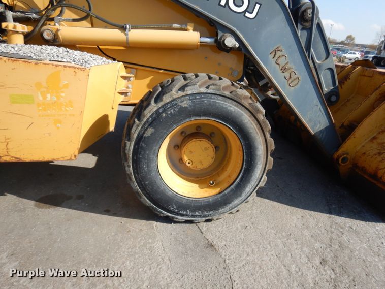 image for item DH7031 2009 John Deere 710J  backhoe