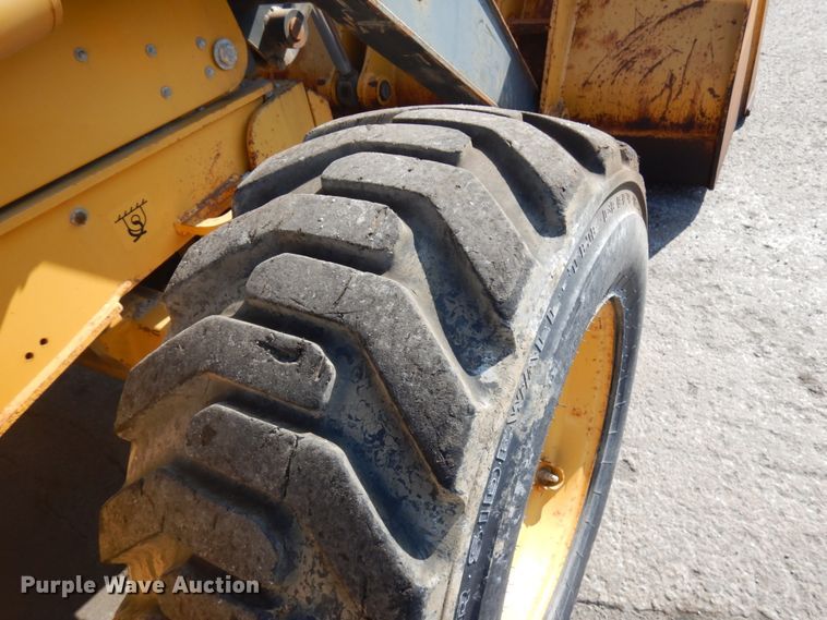 image for item DH7031 2009 John Deere 710J  backhoe