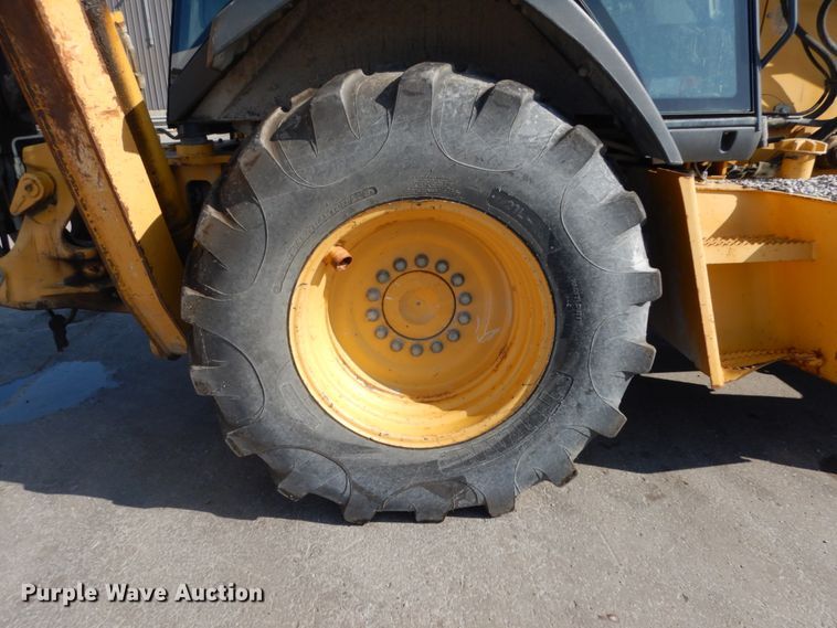 image for item DH7031 2009 John Deere 710J  backhoe