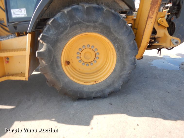 image for item DH7031 2009 John Deere 710J  backhoe