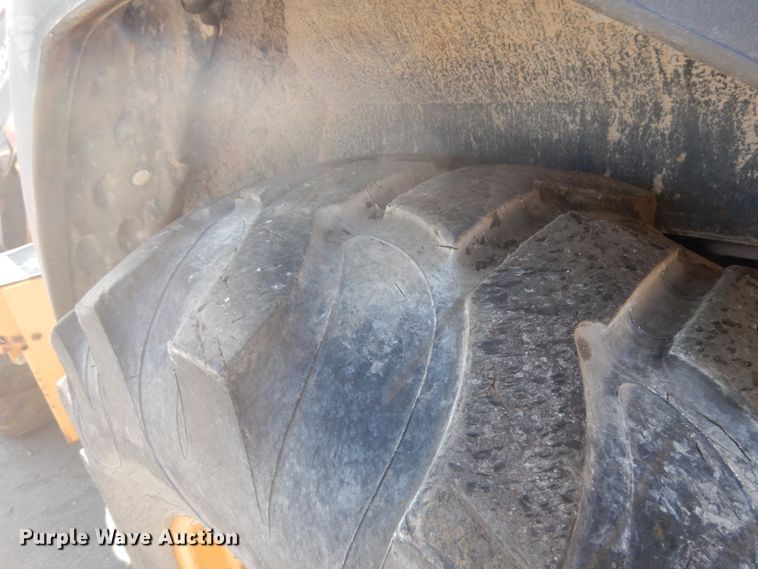 image for item DH7031 2009 John Deere 710J  backhoe