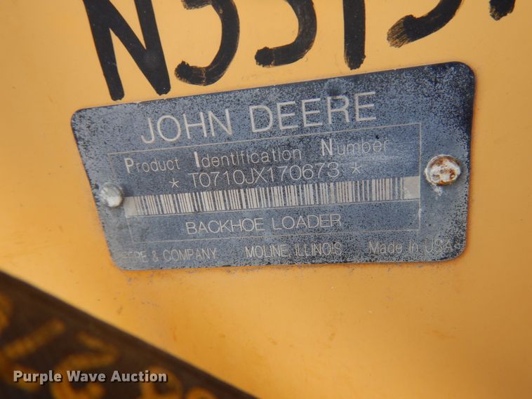 image for item DH7031 2009 John Deere 710J  backhoe