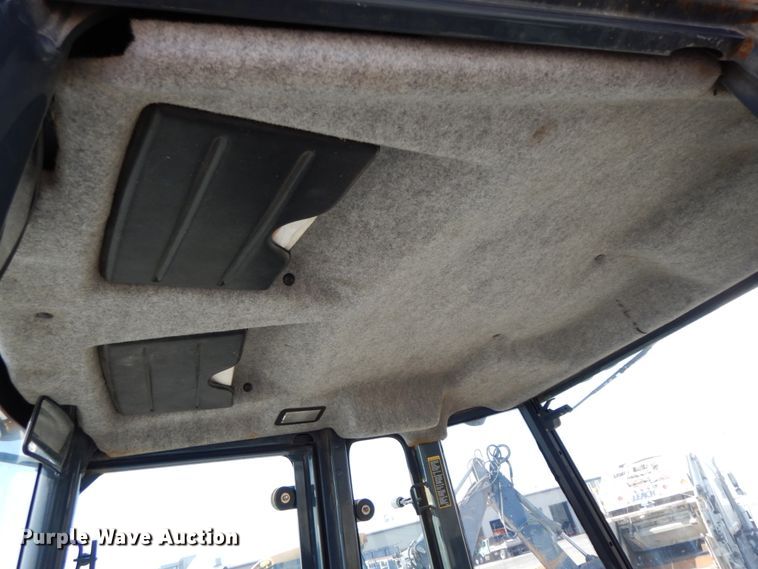 image for item DH7032 2007 John Deere 710G  backhoe