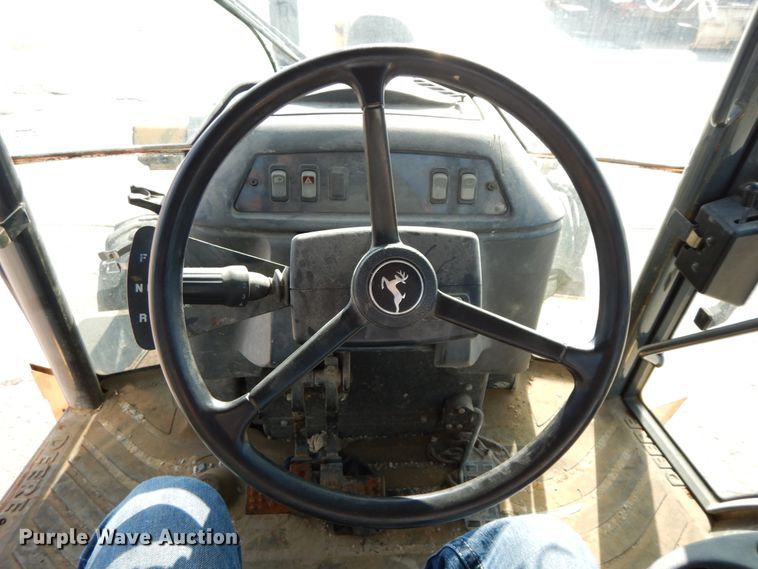 image for item DH7032 2007 John Deere 710G  backhoe