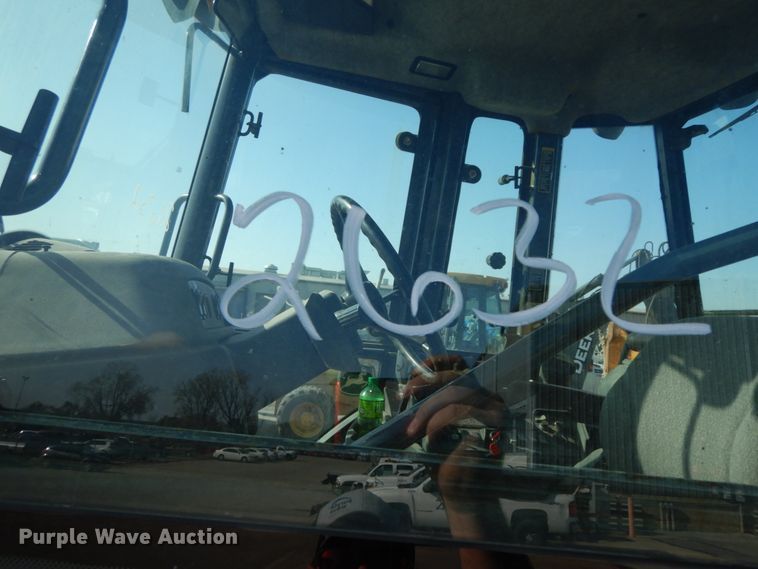 image for item DH7032 2007 John Deere 710G  backhoe