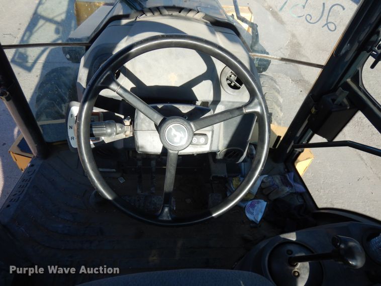 image for item DH7036 2012 John Deere 410K  backhoe