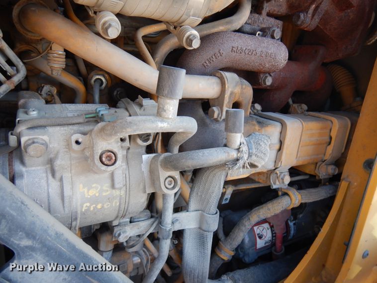 image for item DH7036 2012 John Deere 410K  backhoe